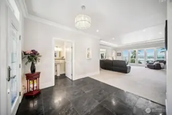 This elegant entry sets the expectations and from here you can see all the way thru the great room and beyond!