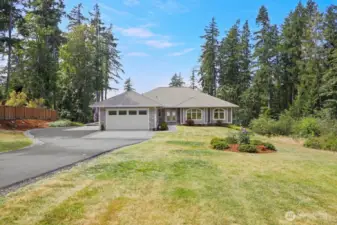 A private easement leads to this one house.... Privacy, Quiet and 2.74 Acres.  This large parcel of land is served by public water and sewer!  Plenty of room for a future swimming pool? Volleyball court? Even room to have a few hens and collect your own fresh eggs and grow a big garden. The garage has Hot & Cold Water for Washing cars.