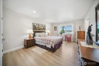 Bedroom 1... solid surface flooring, large window to capture the view, and access to the "jack-n-jill" bathroom area.