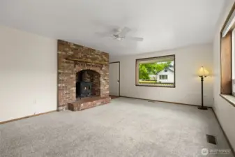 Charming brick fireplace with live edge wood mantle