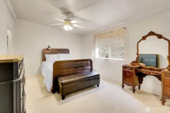 Primary bedroom is large and private. It offers a full en-suite bathroom and large walk-in closet.