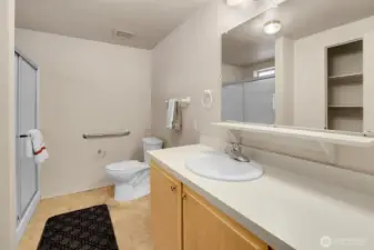Primary En-suite bath with shower-plenty of storage and counter space.
