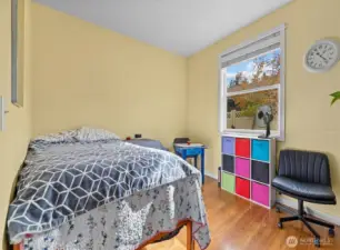 Main floor bedroom with walk in closet and 3/4 bathroom adjacent is perfect for guests or multi-generational living!