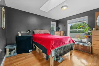 Primary Bedroom features a skylight for added natural light