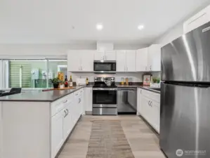 Model unit 13847- LVP flooring, stainless steel appliances, nice and bright