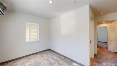 Second floor primary bedroom with walk in closet and ensuite