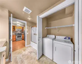 Main bathroom includes washwer and dryer area