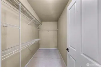 Primary bedroom walk-in closet