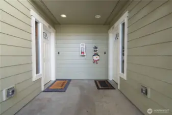 Front entry with door leading to home on the left.