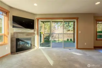 The sliding glass door allows for easy access to the back deck and yard.
