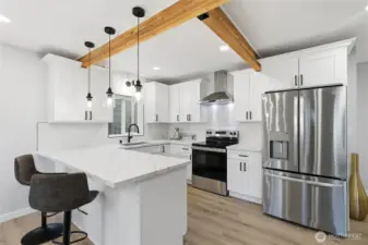 white kitchen backspash and cabinets