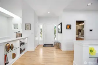 The front entry says it all: Quality, classy, efficient, perfection. The wall niches add architectural interest and can showcase your treasured artwork, statues, pottery, books, and more.