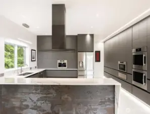 The fascia siding in the foreground is Dekton, in "Trilium", and the beautiful Silestone countertops is Et. Bella. The Futuro Futuro range hood is both sleek and purposeful, with a powerful venting system to eliminate cooking odors.