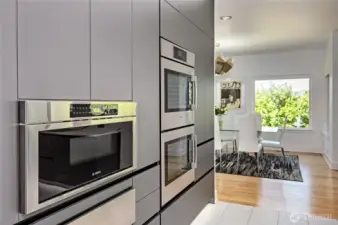Stunning chef’s kitchen with dual Bosch ovens, warming oven, and custom cabinetry—designed for gourmet cooking and effortless entertaining.