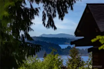Enjoy a pretty peek-a-boo view of Port Ludlow Bay and the Cascade mountains from the deck.