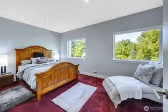 One of two guest rooms in the lower level. All bedrooms enjoy a peaceful view.