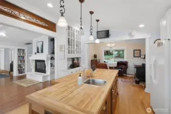 Looking towards the parlor and the dining area to the left. notice the extra cabinets and glass doors & the sink in the island to give more flexibility to the chef.