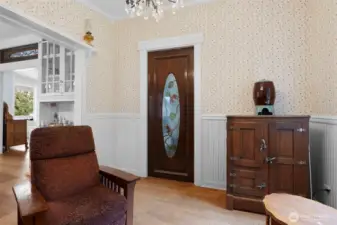 Inside the parlor looking at the pocket door that leads to the living area. This roof is a perfect place to enjoy guests while dinner is cooking ot after the meal.