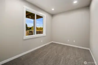 Downstairs guest bedroom #1 w/lake view.