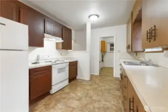 Kitchen with separate Laundry room area.