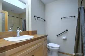 Skylight in bath for that continued warmth of natural light.