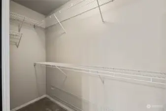 This walk in closet is large, you've got immense space in here.