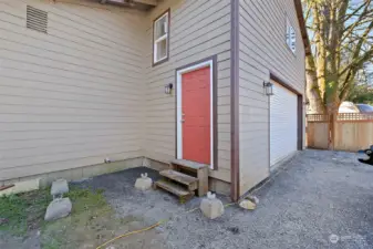 Side entrance to stairway leading up to the upstairs bedroom/flexroom. The second entrance could be used for a accessory dwelling unit/MIL apartment.