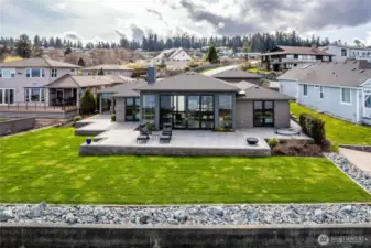 Well designed level waterfront home