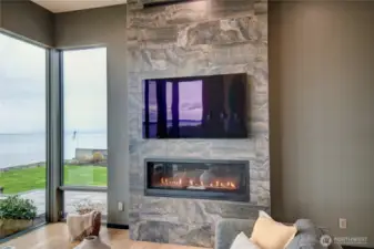 Gorgeous floor to ceiling tiled gas fireplace
