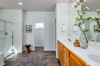 The 5-piece ensuite bath has new floors and a walk-in closet.