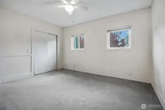 First bedroom suite, with a breezy ceiling fan.