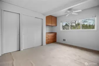 Ceiling fan & bright windows.