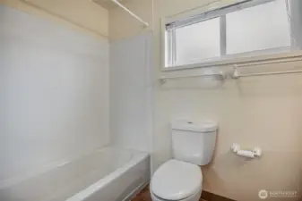 The second bedroom also includes a full en-suite bath.