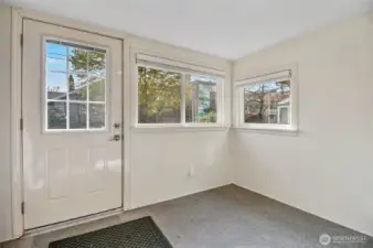 The enclosed back porch is great for storing bikes & outdoor gear.