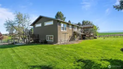 The grassy back and side yards provide room for yard game and maybe, someday, a pool!