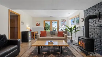 French doors open to a patio that provides a great spot for morning shade.
