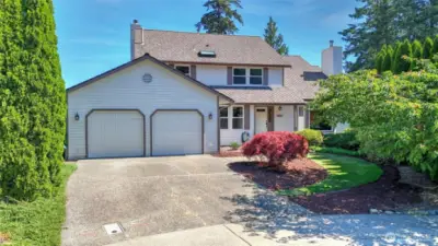 Enjoy mature, manicured landscaping and a lovely cul-de-sac approach to this beautiful home.
