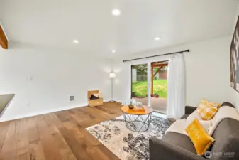 Clean and welcoming with fresh interior paint and natural sunlight.