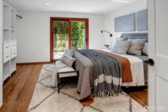 Upstairs bedroom with access to the backyard deck