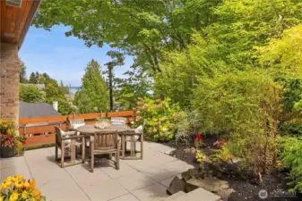 Dine al fresco surrounded by beautiful gardens.