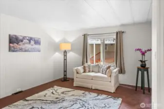 Versatile second living or hobby room.