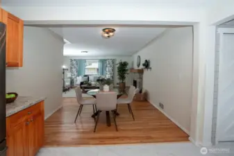 Pretty dining space connects living room to kitchen.