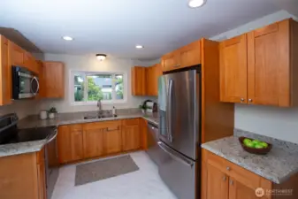 Another peek at your kitchen - don't miss the brand new luxe vinyl tile floors in kitchen and laundry/mudroom.