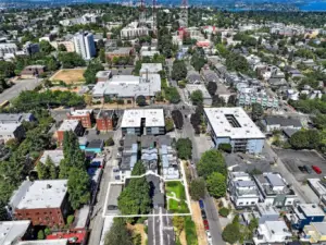 North-Facing Aerial – Walkable to Work, School, and Care  This view highlights Laurel Gate’s unbeatable proximity to major employment and education hubs—just blocks from Swedish Medical Center, Seattle University, and Seattle Central College. Nestled mid-block with a generous setback and mature landscaping, the property offers tenants the ease of car-free living in one of the city’s most interconnected corridors.