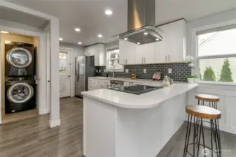 Great kitchen area, with sitting area and laundry adjacent!