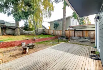 Large deck for entertaining, firepit for chill nights & BBQ area!