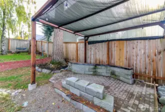 Customer BBQ area with custom wood seating.