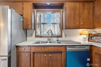 Kitchen window faces the backyard