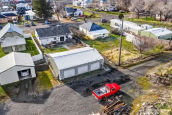 Shop has 3 bays and the lot across the alley is included, great for extra parking.