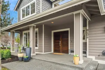 Double entry doors open to the welcoming 2-story foyer.